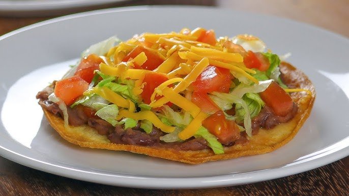 Cheesy Guacamole Tostada