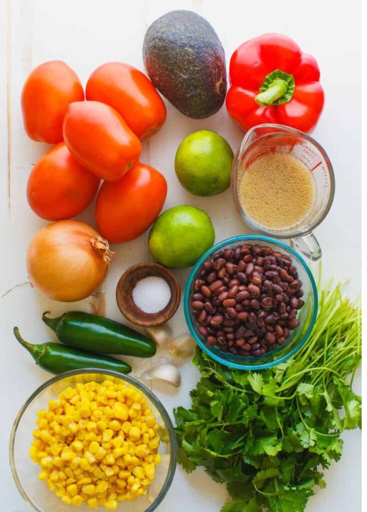 Looking for the best Cowboy Caviar recipe? This fresh and easy black bean salsa is loaded with avocado, corn, tomatoes, and the best dressing. Perfect for cookouts, parties, and summer gatherings!
