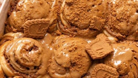 There’s something magical about pulling a pan of warm cinnamon rolls from the oven, especially when those rolls are packed with Biscoff cookie butter. These Biscoff Cookie Butter Cinnamon Rolls take the classic homemade cinnamon roll and give it a delicious cookie-butter twist. The dough is soft and fluffy, the center is filled with buttery brown sugar, cinnamon, and rich Biscoff spread, and the finished rolls can be topped with a creamy Biscoff frosting or an extra drizzle of warmed cookie butter. The result? Soft, gooey cinnamon rolls with warm cinnamon spice and that unmistakable caramelized Biscoff flavor in every bite. They’re perfect for a lazy weekend breakfast, holiday brunch, afternoon coffee, or whenever you're craving something sweet and comforting. Biscoff is especially well suited to cinnamon rolls because its caramelized, lightly spiced flavor complements the cinnamon filling beautifully. Why You'll Love Biscoff Cookie Butter Cinnamon Rolls Soft and fluffy texture: The homemade yeast dough bakes into wonderfully tender rolls with a pillowy center. Every bite has that bakery-style softness you want from a great cinnamon roll. Rich Biscoff flavor: Cookie butter melts into the cinnamon filling, creating a deep caramelized and gently spiced flavor. It turns an ordinary cinnamon roll into something extra special. Gooey cinnamon filling: Brown sugar, butter, cinnamon, and Biscoff create a luscious filling that settles beautifully between the layers. The center is the best part! Perfect for breakfast or brunch: These rolls make a cozy weekend breakfast but are also impressive enough for holidays and special occasions. Serve them warm with coffee, tea, or a cold glass of milk. A Biscoff lover's dream: From the filling to the optional frosting and cookie crumbs, there are plenty of ways to add more Biscoff flavor. One bite and you'll understand the obsession. What Makes Homemade Better? Store-bought cinnamon rolls are convenient, but homemade rolls have a completely different texture and flavor. When you make these Biscoff cinnamon rolls from scratch, you can control the dough, filling, sweetness, and amount of cookie butter. The dough is allowed to rise until soft and puffy, giving the finished rolls a tender texture that pairs beautifully with the rich filling. Homemade also means you can serve them warm from the oven, when the Biscoff filling is soft and gooey and the aroma of cinnamon fills the kitchen. And perhaps the biggest advantage is customization. Want extra cookie butter? Add it. Love crushed Biscoff cookies? Sprinkle them over the top. Prefer cream cheese frosting? Make it extra thick. Ingredients You’ll Need These irresistible Biscoff Cookie Butter Cinnamon Rolls feature a pillowy homemade dough wrapped around a decadent cinnamon-cookie butter filling, all finished with a silky glaze on top. The recipe involves a few steps, but every ingredient is straightforward to track down. This batch yields about 10 to 12 cinnamon rolls. For the Dough All-purpose flour — Creates the structure for the rolls while keeping the dough tender. Warm whole milk — Adds richness and moisture while helping create a soft, fluffy dough. Active dry or instant yeast — Gives the dough its lift and creates those light, airy layers. Granulated sugar — Adds sweetness to the dough and helps create a beautifully tender texture. Unsalted butter — Brings richness and softness to the dough. Eggs — Add structure, richness, and tenderness. Salt — Balances the sweetness and brings out the flavors of the butter, cinnamon, and Biscoff. For the Biscoff Filling Biscoff cookie butter — The star ingredient, adding that signature caramelized cookie flavor throughout the swirls. Unsalted butter — Helps create a rich, spreadable filling that melts beautifully into the dough. Brown sugar — Adds deep molasses sweetness and helps create a gooey cinnamon-roll center. Ground cinnamon — Gives the filling its classic warm, aromatic cinnamon flavor. Crushed Biscoff cookies — Optional, but highly recommended if you want extra cookie flavor and a little texture. For the Topping Cream cheese — Creates a smooth, slightly tangy frosting that balances the sweetness of the cookie butter. Biscoff cookie butter — Adds another layer of caramelized cookie flavor to the frosting. Powdered sugar — Sweetens the frosting while keeping it smooth. Vanilla extract — Adds a subtle layer of warmth and rounds out the flavors. Milk or heavy cream — Helps adjust the frosting to the perfect drizzleable consistency. Extra Biscoff cookies — Crushed cookies make an easy and attractive finishing touch. The combination of cookie butter, cinnamon, brown sugar, and a creamy topping is a common approach in Biscoff cinnamon-roll recipes because the flavors complement the enriched dough particularly well. Step-By-Step Direction Step 1: Prepare the Yeast Warm the milk until it is comfortably warm rather than hot. Combine it with the yeast and a little sugar, then let it sit until the mixture becomes foamy. If you're using instant yeast, you can generally mix it directly into the dough ingredients, but allowing the yeast to foam is a useful way to check that active dry yeast is working. Step 2: Make the Dough Add the melted butter, eggs, sugar, flour, and salt. Mix until a soft dough forms. Knead the dough until it becomes smooth and elastic. It should feel soft and slightly tacky rather than dry and stiff. Avoid adding too much flour because that can make the finished cinnamon rolls heavy. Step 3: Let the Dough Rise Place the dough in a lightly greased bowl and cover it. Let it rise in a warm, draft-free place until it becomes noticeably puffy and roughly doubles in size. This first rise is important because it gives the yeast time to develop the dough's structure and airy texture. Similar Biscoff cinnamon-roll recipes use a first rise followed by a second proof after shaping. Step 4: Roll Out the Dough Transfer the risen dough to a lightly floured surface and gently roll it into a large rectangle. Try to keep the thickness fairly even so the finished rolls bake consistently. Step 5: Add the Biscoff Filling Spread softened butter over the dough, followed by a thin, even layer of Biscoff cookie butter. Sprinkle the brown sugar and cinnamon evenly over the top. For even more Biscoff flavor, add finely crushed Biscoff cookies. Don't make the filling excessively thick. A thin, even layer makes the dough easier to roll and helps keep the beautiful spiral intact. Step 6: Roll and Slice Starting from one long edge, carefully roll the dough into a snug log. Use a sharp knife or unflavored dental floss to cut the log into even pieces. Arrange the rolls in a greased baking dish with the swirls facing upward. Step 7: Give the Rolls a Second Rise Cover the shaped rolls and allow them to rise again until they look soft, puffy, and expanded. This second proof helps produce the light, fluffy texture associated with bakery-style cinnamon rolls. Step 8: Bake Until Golden Bake the rolls in a preheated oven until the tops are lightly golden and the center rolls are cooked through. Keep an eye on them toward the end of baking. You want the rolls baked through but still soft and tender rather than dry. Step 9: Make the Biscoff Frosting While the rolls cool slightly, beat softened cream cheese and butter until smooth. Add Biscoff cookie butter, powdered sugar, and vanilla, then mix until creamy. If the frosting is too thick, add a small amount of milk or cream until it reaches your preferred consistency. Step 10: Frost and Serve Spread the frosting generously over the warm cinnamon rolls. For the ultimate Biscoff finish, drizzle warmed cookie butter over the top and scatter crushed Biscoff cookies across the rolls. Serve while they're still warm and gooey. Serving Suggestions With morning coffee — The caramelized cookie flavor pairs beautifully with a hot cup of coffee. With a cold glass of milk — A classic combination that balances the richness of the rolls. For weekend brunch — Serve alongside fresh berries, scrambled eggs, or a savory breakfast casserole. For holiday breakfast — These make a cozy addition to Thanksgiving, Christmas, or other special-morning menus. As an afternoon dessert — Warm one slightly and enjoy it with tea or coffee. With extra Biscoff drizzle — Warm a little cookie butter until smooth and drizzle it over individual servings. With crushed cookies — Add extra Biscoff crumbs immediately before serving for texture and visual appeal. Tips for the Best Results Don't over-flour the dough: A slightly tacky dough usually produces softer cinnamon rolls than a stiff, heavily floured dough. Add flour gradually and stop when the dough becomes manageable. Use warm, not hot, milk: Extremely hot milk can damage the yeast. The milk should feel warm rather than steaming hot when you add it. Warm the cookie butter slightly: Biscoff spread becomes easier to spread when gently warmed. A thin layer gives you better swirls and makes rolling the dough easier. Give the dough enough time to rise: Don't rely only on the clock; look for a dough that has become noticeably puffy and expanded. The dough's appearance matters more than an exact rising time. Don't overbake: Cinnamon rolls continue to firm up as they cool. Bake just until golden and cooked through so they stay soft and gooey in the center. Storage Tips Refrigerator Store leftover Biscoff cinnamon rolls in an airtight container in the refrigerator. They should stay soft for several days, although the texture is best when reheated. If possible, keep extra frosting separate and add it after reheating. Freezer For longer storage, freeze the baked rolls once they have cooled completely. Wrap individual rolls tightly and place them in a freezer-safe container or bag. You can also freeze the unbaked shaped rolls for a convenient make-ahead option, although the thawing and proofing process should be handled carefully. Reheating For the softest texture, warm individual rolls gently in the microwave until heated through. You can also reheat them in a low-temperature oven. Add a small drizzle of cookie butter or a little frosting afterward to bring back that fresh-from-the-oven richness. Make-ahead versions of Biscoff cinnamon rolls can also be assembled, refrigerated, and baked later; this is particularly useful for holiday breakfasts and brunches. Final Thoughts These Biscoff Cookie Butter Cinnamon Rolls are everything you want in a homemade sweet roll: soft, fluffy dough, a buttery cinnamon filling, rich cookie butter, and a creamy topping. The Biscoff flavor makes them feel a little more special than traditional cinnamon rolls without making the recipe complicated. They're the kind of treat that fills the kitchen with an irresistible aroma and makes everyone wonder when they can have the first one. For a cozy weekend breakfast, holiday brunch, or indulgent dessert, warm Biscoff cinnamon rolls are hard to resist. And if you're a serious Biscoff fan, don't stop with the frosting—add a warm cookie-butter drizzle and a sprinkle of crushed cookies right before serving. That's when these soft, gooey rolls really shine.