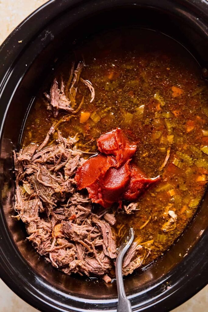 Step 6 Shred the Beef and Thicken the Ragu